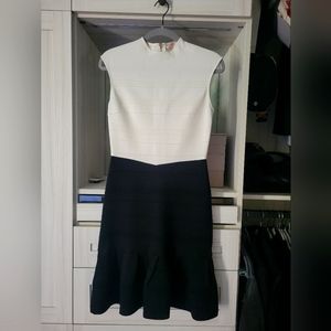 EXCELLENT Condition Ted Baker Size 2 (US 6) fitted with ruffle bottom detail.